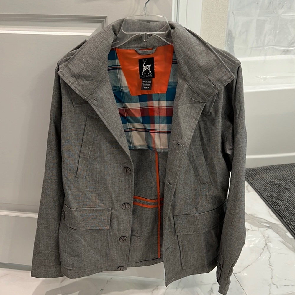 Kane and Unke Medium jacket with zippered hood.
